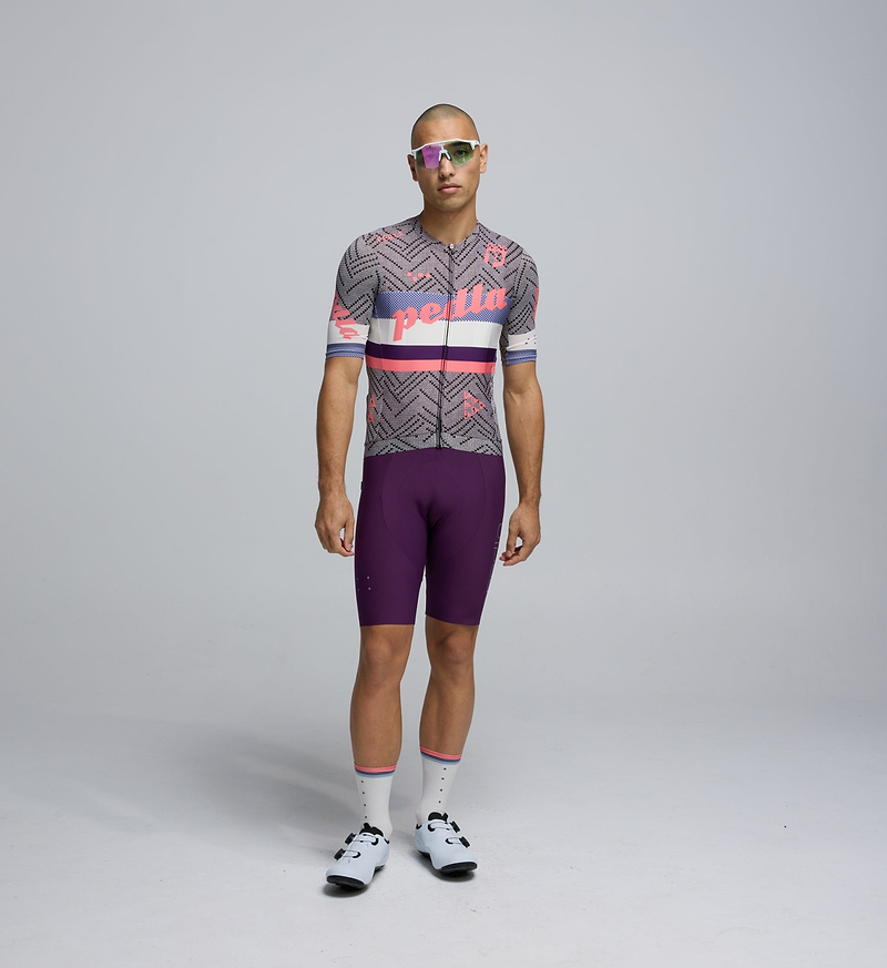Front view of cyclist wearing the RideKnit Classic Jersey – form-fitting design with extended sleeves and low-cut collar