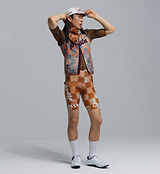 Side view Heritage amber checkered cycling cap paired with matching retro checkered kit — vintage-style road, gravel and commuter cycling cap, cafe-stop ready cycling accessory
