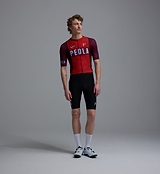 Heritage men's Classic road cycling jersey, traditional Fox Red front view on model — slim-fit short-sleeve PEDLA/LunaLUXE, breathable SPF50 moisture-wicking four-way stretch fabric, ventilation panels, low-cut collar and silicone hem gripper