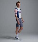 Men's Heritage Classic cycling jersey side view, vintage white with pink sleeves and navy panels; LunaLUXE performance road kit, SPF50 breathable, moisture-wicking, four-way stretch, ventilation panels, silicone hem gripper, extended sleeves, low-cut collar