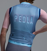 Heritage Men's Classic LITE gilet powder blue cycling vest, lightweight windproof water-resistant recycled shell with breathable mesh back, reflective details, silicone hem and three reinforced rear pockets for training, road rides and commuting