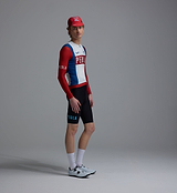 Heritage men's vintage red long-sleeve classic cycling jersey on model, form-fitting SPF50 moisture-wicking, four-way stretch, side ventilation panels and silicone hem gripper for road and training rides