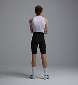 Men's black Heritage training bib shorts, back view — compressive fit with white breathable mesh bib straps, seamless cuff, reflective logos, premium European fabrics and padded chamois for cycling