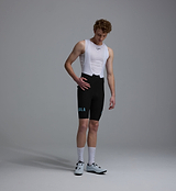 Heritage men's black training cycling bib short, front view — compressive fit, breathable mesh braces, built-in chamois, seamless cuff, reflective logos, premium European fabrics.