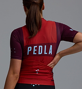 Heritage women's Classic cycling jersey in traditional fox red - PEDLA LunaLUXE performance jersey, SPF50 sun protection, moisture-wicking four-way stretch fabric, ventilation panels, extended sleeves, low-cut collar and silicone hem gripper