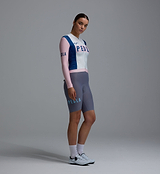 Heritage women's classic long‑sleeve cycling jersey side view in vintage white with pink and blue panels, SPF50 moisture‑wicking breathable four‑way stretch, ventilation panels, silicone hem gripper, form‑fitting