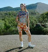 Pedla Women's SuperFIT 2.0 Checkers Amber cycling bib shorts — Italian fabric, Elastic Interface chamois, advanced brace support and ventilation, seamless non-stitched cuff with reflective logos; aerodynamic muscle-support for road and endurance rides.