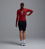 Women's Heritage Thermal long-sleeve cycling jersey back view in solid fox red, Chillblock thermal fleece, moisture-wicking, UPF 50+, reflective logos, articulated sleeves, 3 rear pockets with zip side pocket, hem gripper