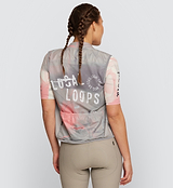Back view of LOCAL LOOPS Women's Classic Cycling Gilet in Club Stone on model, featuring a breathable mesh back panel for added airflow and ventilation, making it ideal for wind and weather protection during cycling in changing conditions.