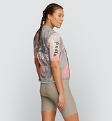 Side view of LOCAL LOOPS Women's Classic Cycling Gilet in Club Stone on model, highlighting the tailored fit, lightweight construction, and breathable mesh back panel that provide protection, ventilation, and comfort on long bike rides.