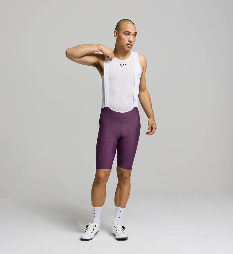 Men's SuperFIT 2.0 Cycling Bib Shorts showcasing a streamlined fit, seamless cuff, and reflective detailing for enhanced visibility.
