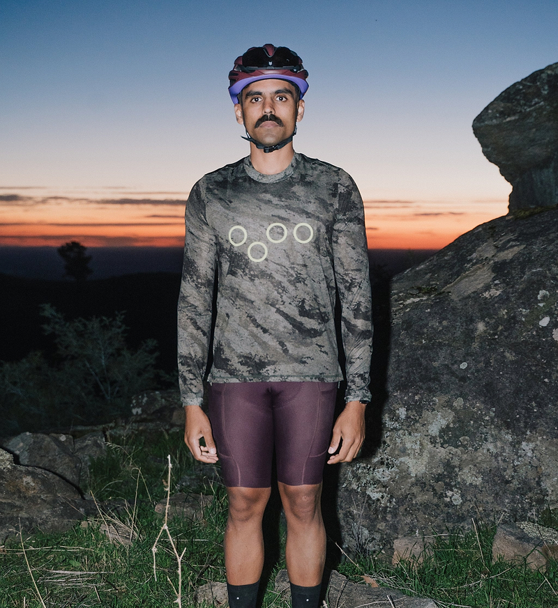 Men's ON_OFF Grid long-sleeve cycling tech tee, Granite Grain, ultralight breathable Italian knit, UPF 50%, extended sleeve coverage, flatlock seams and hydration tube channel; ideal for gravel, endurance and off-grid adventure riding