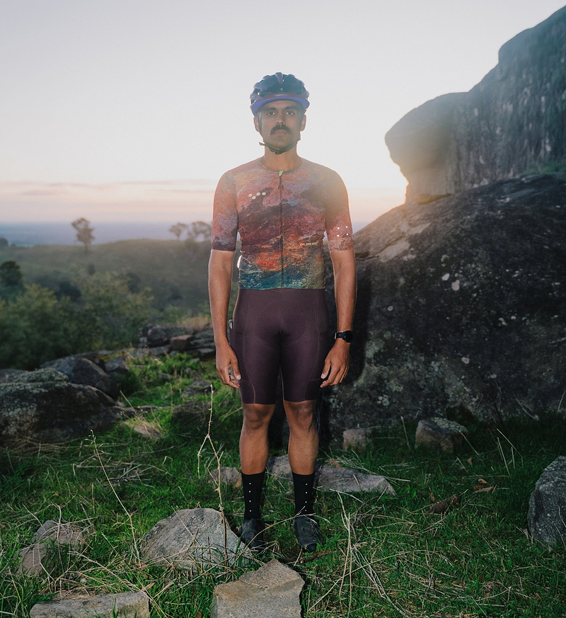 ON_OFF GRID SuperSYSTEM men's ultralight breathable high-stretch short-sleeve cycling jersey, rock-print, moisture-wicking, hydration-tube channel, bonded hem and reflective accents for gravel, road and mixed-terrain