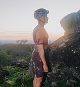 ON_OFF GRID SuperSYSTEM men's cycling jersey side view on rider, ultralight breathable moisture-wicking fabric, performance fit with bonded hem, ergonomic sleeves, smart storage and reflective accents for gravel/road