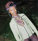 On_Off Grid unisex Rock bandana worn as neck gaiter by cyclist with helmet, lightweight sun-protection, versatile outdoor cycling accessory and stylish multifunctional headscarf