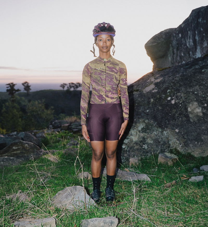 ON_OFF GRID SuperSYSTEM women's long-sleeve cycling jersey in Multi Rock camo — ultralight, high-stretch breathable moisture-wicking gravel and road jersey with bonded hem, ergonomic sleeves, hydration tube channel, reflective accents