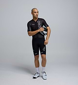 Front-facing image of a male cyclist wearing the Pro Pursuit Crit Suit in Black, highlighting the close-fitting aero cut, low-profile collar, and breathable woven fabric designed for speed.