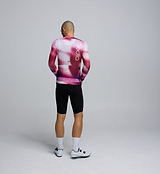 Back view of the AirFoils Hot Pink Pursuit LS 2.0 Jersey, displaying three streamlined rear pockets, reflective accents for visibility, and lightweight support paneling.