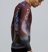 Close-up detail of AeroPRISMA bonded sleeve fabric and heat-welded hem on the Men's Pursuit 2.0 Long Sleeve Cycling Jersey in AirFoils Plum, illustrating the aerodynamic weave and precision finish.