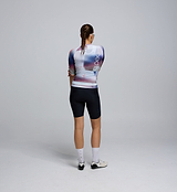 Back view of the Women's Pursuit 2.0 Jersey in AirFoils White, featuring a lightweight rear pocket panel design, reflective accents, and secure triple storage layout.