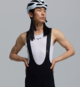 Men's PRO SuperFIT Air black cycling bib tight close-up, lightweight Italian stretch fabric, high-compression 4-way stretch, perforated breathable back, Elastic Interface 8+hr chamois, UPF50+, reflective logos