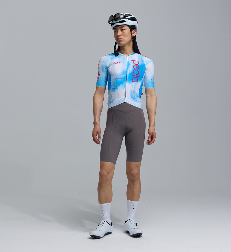 PRO Analogue Pro Pursuit 3.0 race-fit short-sleeve cycling jersey, Analogue blue, front view; Italian performance fabric, AeroPRISMA aero sleeves, heat-welded hem, mesh underarms, reflective accents, 3 rear pockets