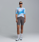 Women's Pro Pursuit 3.0 short-sleeve race-fit cycling jersey, Analogue blue/white, aero Italian fabric, heat-welded AeroPRISMA sleeves, mesh underarms, reflective accents, 3 rear pockets, lightweight aero road jersey (front view)