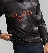 Close-up of ultralight Italian technical knit fabric and hydration tube channel – performance-focused gravel cycling long sleeve tee