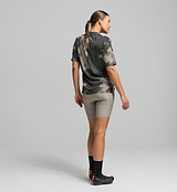 Back view of unisex cycling tech tee in light tone – UPF 50+ protection and integrated pocket-friendly design for gravel adventures