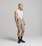 ON_OFF Men's SuperSYSTEM Bib Short Pumice - When adventure calls, the Pedla SuperSYSTEM Bib Shorts answer with next-level performance, comfort, and versatility. Designed for those who go the extra mile, these bib shorts seamlessly integrate storage and hydration solutions directly into your kit—allowing you to travel lighter, ride further, and push harder without compromise.