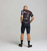 Back view of men’s SuperSYSTEM jersey – technical storage pockets and reflective details for visibility and function on the bike