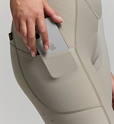 Close-up of rear brace pocket, hose channel, and EIT chamois – technical details of performance bib shorts for hydration and ride efficiency