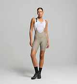 Front view of female cyclist wearing pumice bib shorts – supportive fit with high-density chamois for long-distance comfort