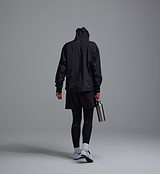 PEDLA x N-0 3-layer waterproof black shell jacket, back view with hood up — laminated stretch nylon, fully taped seams, YKK waterproof zip; technical unisex cycling commuter rain jacket