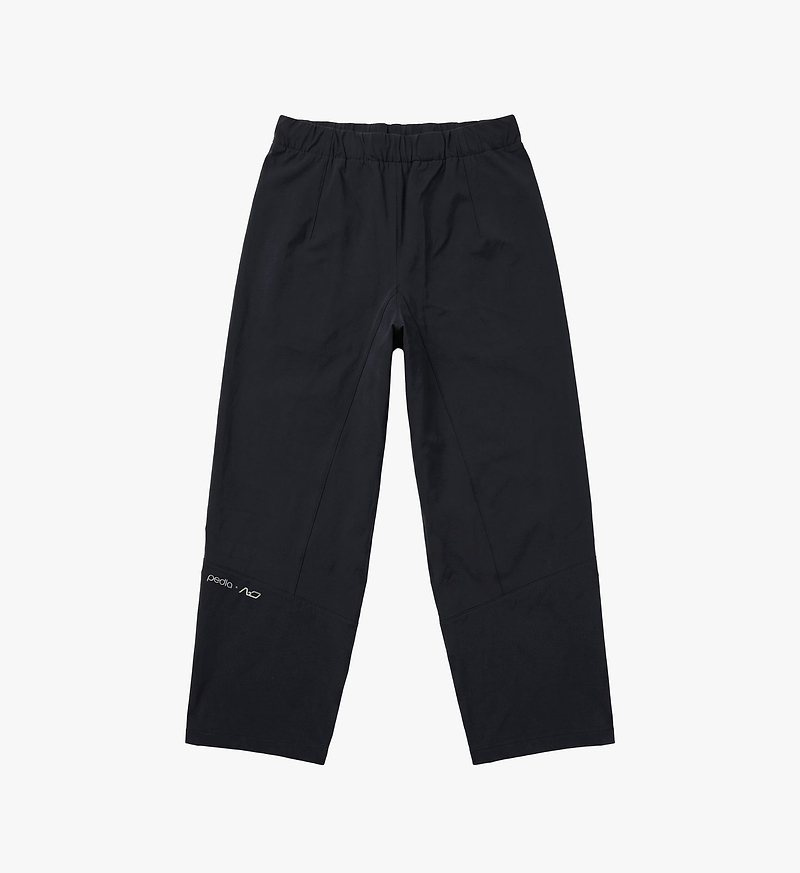 PEDLA x N-0 loose-fit black soft-shell pant, fleece-bonded water-resistant commuter and cycling pant with extended side zips, adjustable nylon webbing waistband, two side pockets — unisex motion-ready streetwear