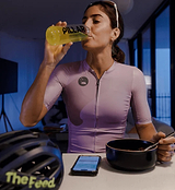 Cyclist in performance kit drinking Pillar Performance ULTRA IMMUNE C tropical powder from a yellow bottle — immune support performance nutrition with 1000mg Vitamin C, 15mg Zinc, 1000 IU Vitamin D3; sugar-free, vegan, Informed Sport certified, made in Australia.