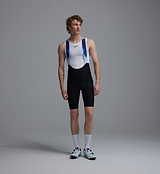 Men's Race Division black training bib shorts with blue bonded Grid Mesh bib straps, premium Italian compressive fabric, multi-density chamois (4+ hrs), race fit 24cm inseam, reflective logos