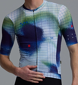 Men's Race Division training cycling jersey close-up, cobalt grid short-sleeve performance road kit with breathable perforated panels, UPF 30+ sun protection, moisture-wicking REPREVE recycled polyester, four-way stretch, silicone gripper hem