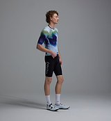 Side-view men's Race Division training cycling jersey in cobalt grid, breathable perforated panels, UPF 30+, 83% REPREVE recycled polyester/17% elastane, silicone gripper hem, extended sleeves, moisture-wicking four-way stretch