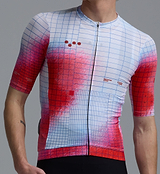 Close-up of men's Race Division red grid training cycling jersey, full-zip, breathable perforated panels, UPF 30+, REPREVE recycled polyester, moisture-wicking four-way stretch, silicone gripper hem