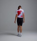 Women's Race Division Classic LITE cycling gilet, lightweight windproof water-resistant vest in red grid print, mesh back, breathable recycled fabric, three rear pockets and reflective details (back view)