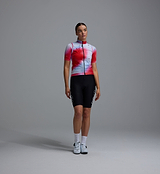 Race Division Women's Classic LITE gilet — red grid cycling vest, lightweight windproof water-resistant breathable recycled fabric with mesh back, reflective accents, two-way zipper and 3 rear pockets