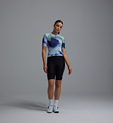 Race Division women's cobalt grid training cycling jersey front, breathable moisture-wicking top with UPF 30+, REPREVE recycled polyester, four-way stretch, silicone gripper hem, extended sleeves, low-cut collar
