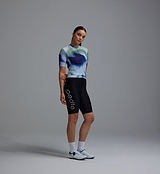 Women's Race Division Training Jersey side view, cobalt grid print short-sleeve cycling jersey, UPF30+ sun protection, REPREVE recycled polyester, breathable perforated panels, silicone gripper hem, moisture-wicking four-way stretch