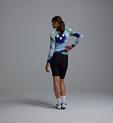 Rear view of women's Race Division long-sleeve training cycling jersey, grid cobalt back print, UPF 30+, REPREVE recycled polyester with elastane, breathable perforated panels, moisture-wicking four-way stretch and silicone gripper hem
