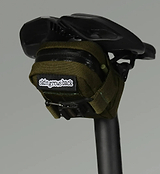 Skingrowsback Plan B Micron olive under-seat saddle bag — compact water-resistant 1000D nylon bike bag with YKK AquaGuard zip and 25mm magnetic strap; fits 29er spare tube, CO2 canister, tyre levers and multi-tool