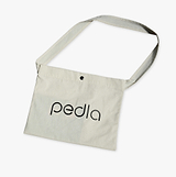 Pedla natural cotton musette bag — lightweight open-top cycling feed-zone shoulder bag with long crossbody strap for race nutrition, energy gels, water bottle, bike essentials and one-handed access