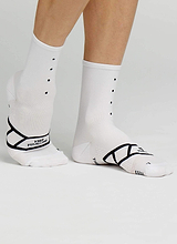 Lightweight Socks White - Introducing the latest in lightweight sock technology: Our Pedla sock is highly breathable with active performance wicking technology for maximum moisture management & temperature control - ideal for hot summer days. Constructed from a Nylon + Coolmax® core spun covered Lycra® containing unsurpassed moisture management and sport stability.