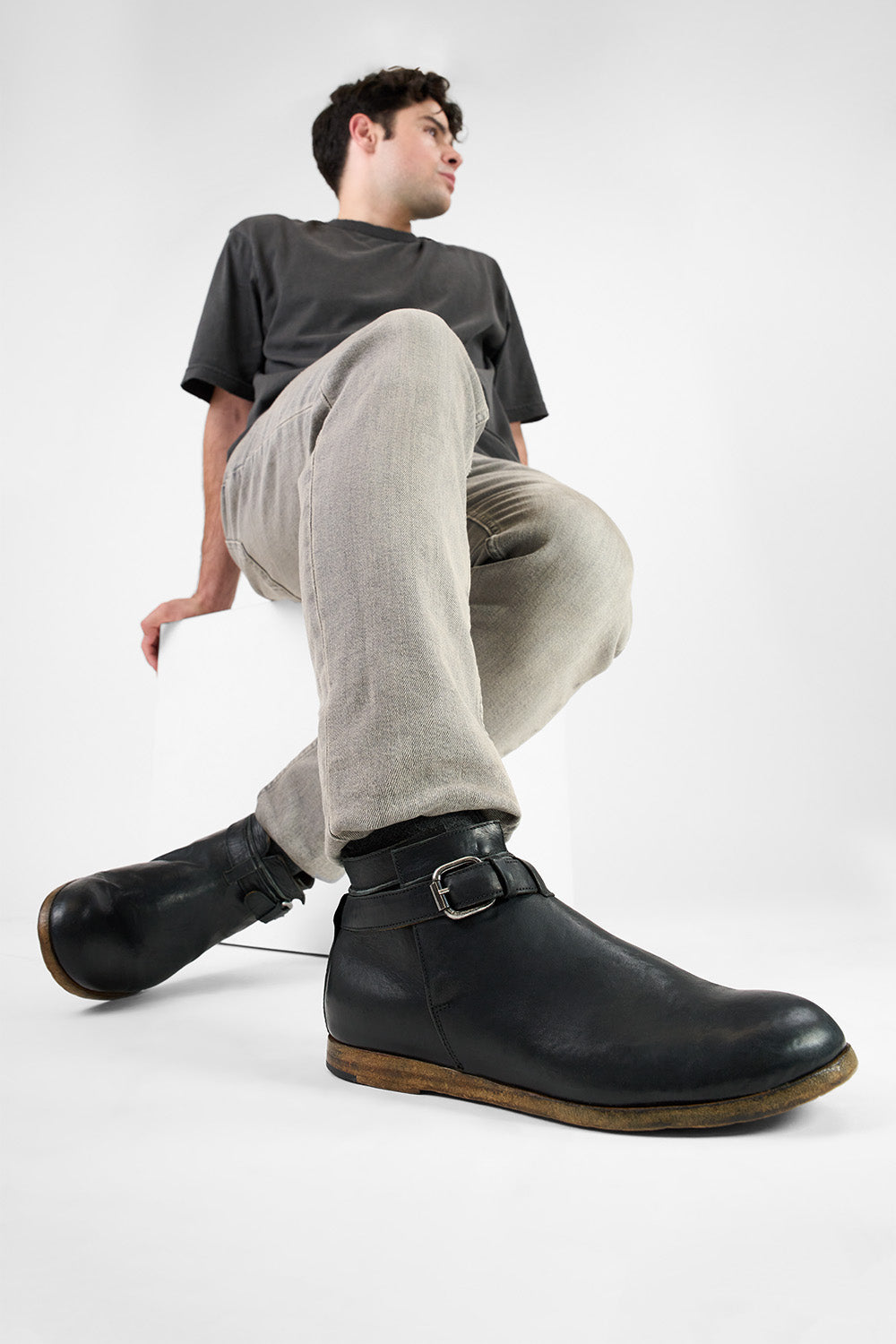 BRUCE rugged-black buckle ankle boots.