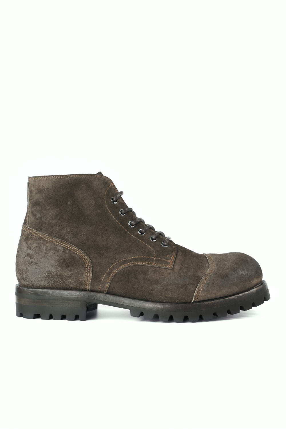 Brown suede boot on a white background